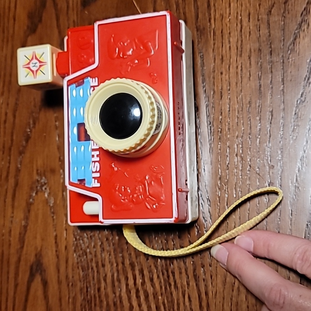 Fix your price changeable picture disc camera